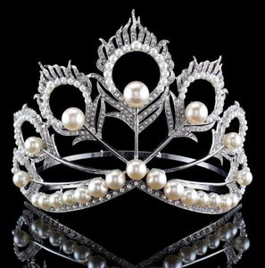 Nieuwe Collectie Big Size 2017 Miss Universe Dezelfde Kroon Volledige Ronde Verstelbare Zilveren Parel Peakcock Feather Tiara Pageant 2102031616485