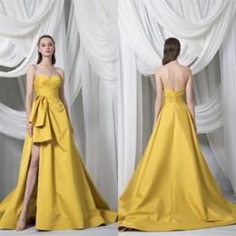 Nieuwe Collectie Avondjurken Sexy Strapless Hoge Kant Split Kant Satijn Prom Gowns Custom Made Backless Sweep Trein Speciale gelegenheden Jurk