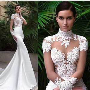 Nouvelle arrivée des robes de mariée sirène haut de couches à manches longues en dentelle appliques en dentelle voir à travers le jardin de plage robe nuptiale