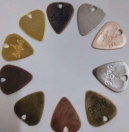 Nieuwe aankomst Metal Guitar Picks Electric Guitar Pick ketting set stuk met solide string Nail 101226585