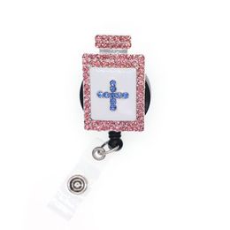 Nieuwe aankomst Key ringen roze strass geneeskunde ontwerp -ID houder/verpleegkundige apotheek pil fles intrekbare badge haspel met zwenkclip