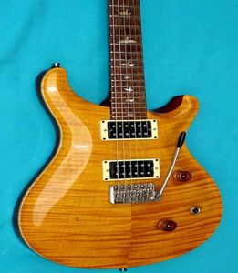 Nueva llegada Stock privado Paul Smith Llama amarilla Tapa de arce Guitarra eléctrica Cuerpo de caoba blanca Pájaros Incrustaciones Puente trémolo Wha7672993