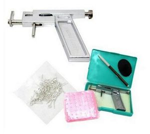 NIEUWE COLLECTIE Professionele Oor Body Neus Piercing Gun Machine Tool Kit Set + 98 Stuks Stalen Studs Piercing de Oor Guns Iron Pak Gratis Verzending