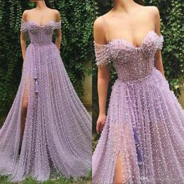 Nouvelle Arrivée Violet Une Ligne Robes De Bal Sheer Cou Hors Épaule Tulle Perles Côté Split Longueur De Plancher Robe De Soirée Formelle Robes ogs296v