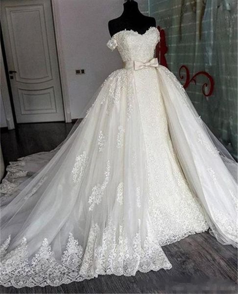 Nuevas llegadas 2019 Vestidos de novia de sirena con falda desmontable Tren fuera del hombro Escote corazón Cola de pez Marfil Encaje Vestidos de novia de lujo