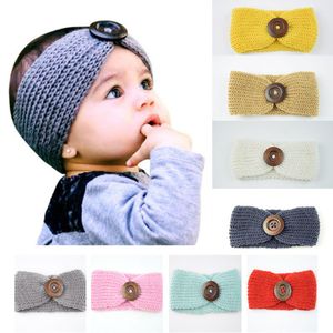 Nieuwe baby meisjes mode wollen haak hoofdband gebreide haarband met knop decor winter pasgeboren baby oor warmer hoofd headwrap 13 kleuren M570