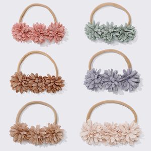 Nieuwe babymeisjes drievoudige bloem nylon hoofdband pasgeboren elastiek elastisch nylon hoofdbanden haar clips peuter kinderen nylon meisjes tulband