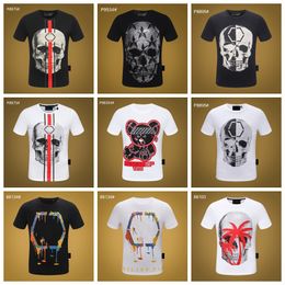 NOUVEAU Hommes Femmes Designer T-shirts Mode homme T-shirt Top Qualité Coton Casual T-shirts À Manches Courtes De Luxe Hip Hop Streetwear T-shirts Strass Crâne T-shirts # CH39.