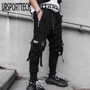 Nieuwe zwarte vrachtbroek Hip Hop Joggers Mannen losse harembroeken Multi-pocket lintbroek Casual streetwear sportbroek voor mannen G220507