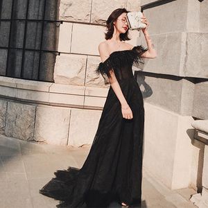 Nieuwe zwarte tule avondjurken met veer sexy off shoulder prom feestjurk formele speciale avond beroemdheden jurken