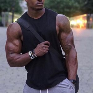 Nouveau blanc chemise sans manches hommes chemise d'entraînement musculation Stringer débardeur homme Fitness vêtements coton Muscle gilet 210421