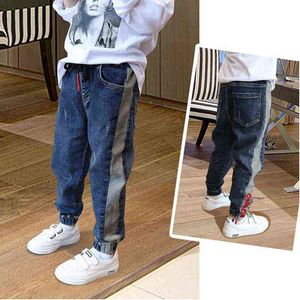 Nouvelle mode pour garçons en 2021 au printemps et en automne avec une lettre de couleur unie imprimée Jeans Pantalons Garçons pantalon ceinture en cuir décontracté G1220