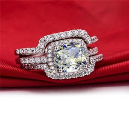 Nuevo conjunto nupcial Conjuntos de anillos de boda Cojín de 3 quilates Corte princesa Calidad NSCD Gema sintética Conjuntos de anillos de 3 piezas 5458470