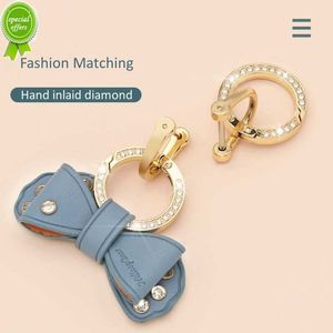 NIEUWE AUTO KREKING GOUD GOUDE REGESTONE METAL RING LEDER BOW Leuke sleutelhanger accessoires voor vrouwen Men Llaveros de Motos Moto Auto Key Holder