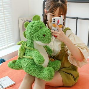 Nouveau dessin animé vert sac à dos dinosaure en peluche poupée dinosaure mascotte échange fabricant en gros