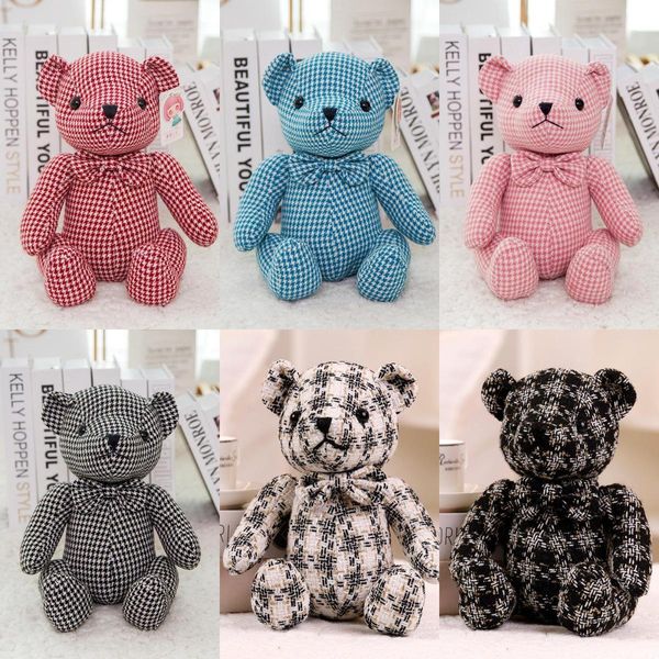 Nouveau dessin animé Stripe Bear Doll mignon à carreaux Little ours en peluche créative de poupée en peluche Fabricant direct