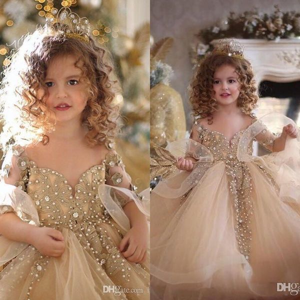 Nuevos vestidos de champán vestidos de concurso de encaje de encaje de encaje de mangas largas perlas princesa organa gotas de cumpleaños para niñas de flores hojiculantes 403