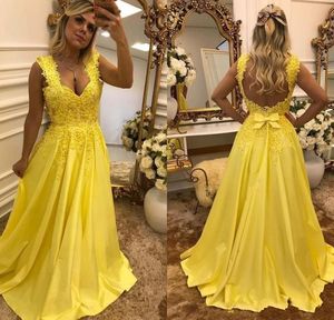 Nieuwe goedkope A-line prom-jurken gele mouwloze v-hals satijn kanten appliques buigen open back sweep trein plus size feest avondjurken