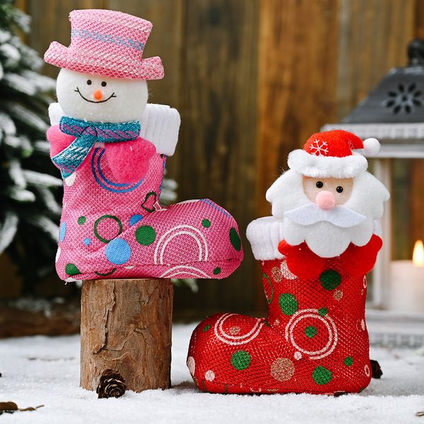 Nouvelles décorations de Noël Tête de dessin animé Bottes en tissu brillant Rouge Rose Bottes de bonbons Cadeaux Petites chaussures en gros Europe et Amérique 2021 Nouvel An