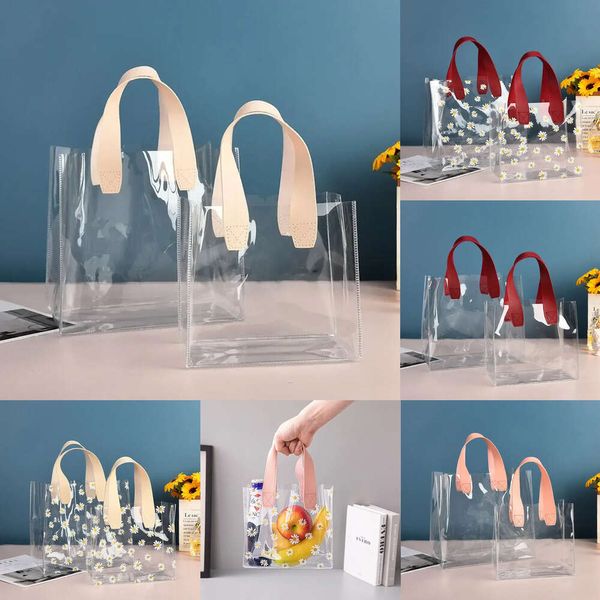 Nuevos suministros de juguetes de Navidad 1 PC Transparente PVC Regalos bolsas de embalaje Bag Clear Daisy Bag Bag Bag Candy Bag Bag Bode Fiesta de bodas Bolsa Cosmética