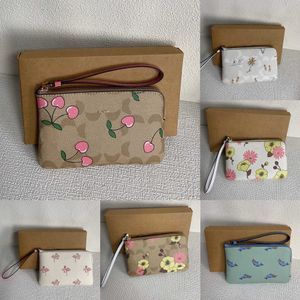 NIEUWE portemonnees designer sleutelzakje coabag vrouwen middellange sleutelhanger portemonnee Leuke Cherry Bloemenprint Meisjes Portemonnee handtassen clutch 231110