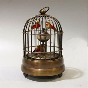 Nuevo coleccionable decorar antiguo trabajo hecho a mano cobre dos pájaros en jaula reloj de mesa mecánico 309p