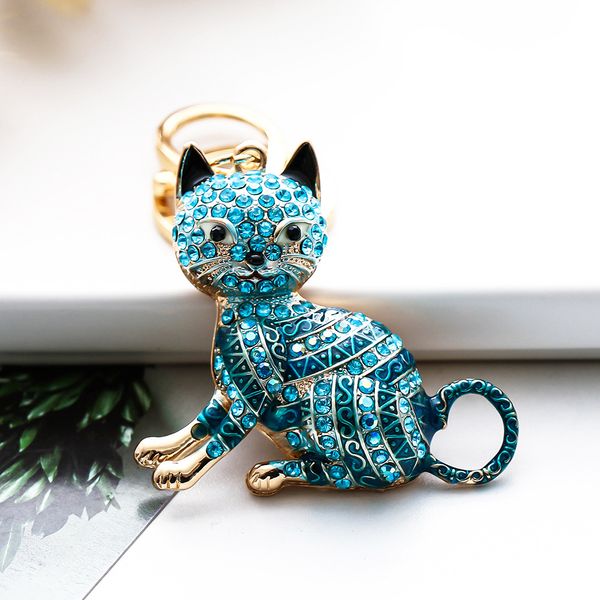 Nuevo color de diamantes de imitación gato de dibujos animados creativo llavero de metal colgante de coche personalizado fabricante venta directa pequeños regalos