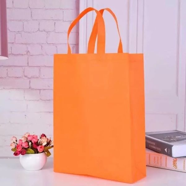 Nouveaux sacs pliants colorés Tissu non tissé Sacs à provisions pliables Réutilisables Sacs pliants écologiques Nouvelles Sacs de rangement pour dames Inventaire en gros