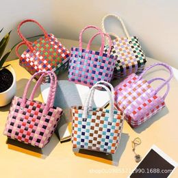 Nieuwe kleurrijke geruit plastic geweven tas