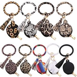 Nouveau Coloré PU En Cuir Glands Bracelets Porte-clés Party Favor Bracelet Tournesol Léopard Écouteur Sacs Maquillage Sac Avec Miroir Porte-clés Têtes 1130