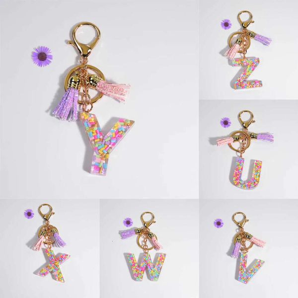 Nouveau élastique en caoutchouc de coffre de couleur Keychain A-Z Lettres de résine Tassels Pichets Pendant Femmes Sac ACCESSOIRES ACCESSOIRE