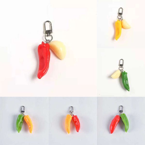 Nouveau clés coloré en résine de chilli clés d'ail de plats à l'ail de légumes pour femmes hommes cadeau de sac créatif unique accessoires de voiture