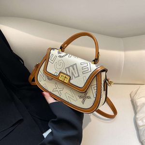 Nouveau sac à main contrasté pour femmes avec texture polyvalente, sac à bandoulière à une épaule, petit sac imprimé 2024 78% de réduction sur la vente en gros en magasin