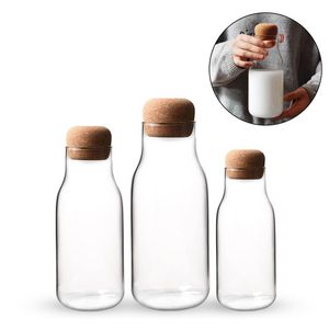 Nueva botella de vidrio de corcho, botella de jugo de leche resistente al calor, lata de almacenamiento transparente, tanque de almacenamiento de café sellado, triangulación de envíos