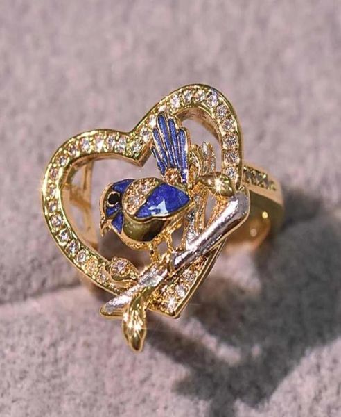 Nuevo y creativo anillo de pájaro azul gorrión Wren, pegamento chapado en oro europeo y americano, diamante que cae, anillo de oro de 14k que brilla en la oscuridad83694893181