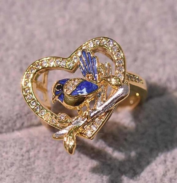 Nuevo y creativo anillo de pájaro azul gorrión Wren, pegamento chapado en oro europeo y americano, diamante que cae, anillo de oro de 14k que brilla en la oscuridad83692849089