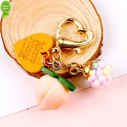 Nieuwe schattige mini gesimuleerde perzik sleutelhanger hartbrief plastic plaque hanger voor meisjes zak hoofdtelefoon kas decoratie diy accessoires