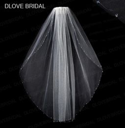 Nouveau design Veille nuptiale en cristal clair avec peigne un doigt de bout de la longueur de la longueur des cheveux perlé accessoire blanc ivory7026712