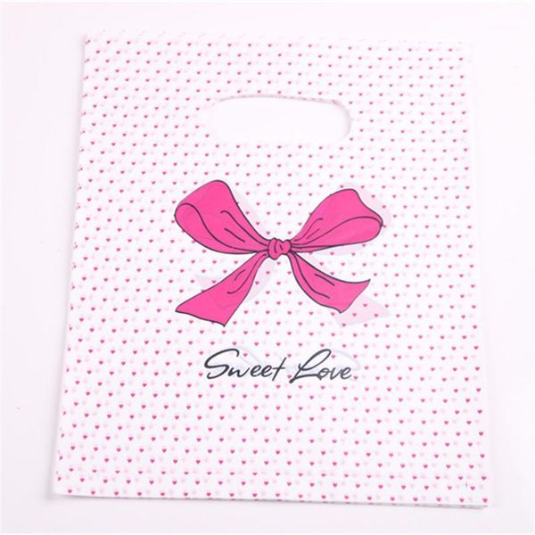 Diseño de envoltura de regalo al por mayor 100pcs / lot 20 * 25cm Bolsas de envasado de amor dulce rosado para camiseta de compras de plástico con punto Bow1