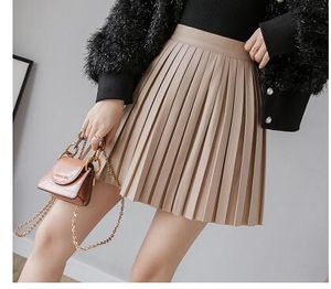 Nouveau design femmes mode sexy taille haute en cuir PU jupe courte plissée plus la taille S M L XL XXL