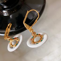 Nieuw ontworpen mode luxueuze oorstudie groene edelsteen saturn hanger dames oorbellen micro ingelegde diamanten lente zomer sieraden a021