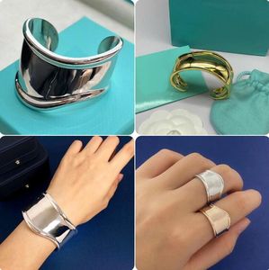 nieuw ontworpen mannen robuuste bangle titanium staal medium bot manchet in zilver goud t-letter onregelmatige glanzende breed gezicht armband oorbel ring vrouwen hiphop rock sieraden