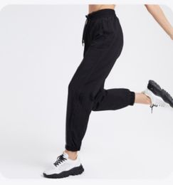 Nouveau Designer Active Sets Active Pants Yoga nouveaux vêtements de yoga femmes hanche levage taille haute sports serrés course à séchage rapide Yoga pantalons de fitness