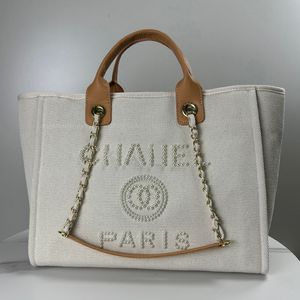 2024 Nieuwe Designer Tas Klassieke Tote Bag Grote Capaciteit Handtas Luxe Hoge Kwaliteit Mode Veelzijdige Parel Ingelegd Ontwerp Luxe Tas Zomer Canvas Tas