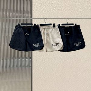 Nuevos pantalones cortos de playa de diseñador FG7C Reflection Print Logo Pantalones cortos de nylon Pantalones cortos sueltos de gran tamaño de hip hop para hombres y mujeres
