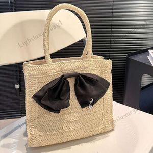 Nuevo diseñador Big Bow Diamond Colgante Tote de paja Fahion Summer Beach Bag MM Bolsos Bolso de hombro para mujer Bolso tejido de lujo Bolso de vacaciones clásico para mujer 240324