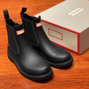 Botas de diseñador de lujo de moda Hunter Tobillo invierno negro Zapato casual caucho vintage Alta calidad explorar martin bota mujer hombres planos botines caminata al aire libre Caja de bota de lluvia