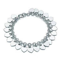 Nouvelle chaîne de créateurs bracelet luxe multiple bracelets cardiaques pour femmes en acier inoxydable couple chaîne de brins à la main bijoux accessoires en gros