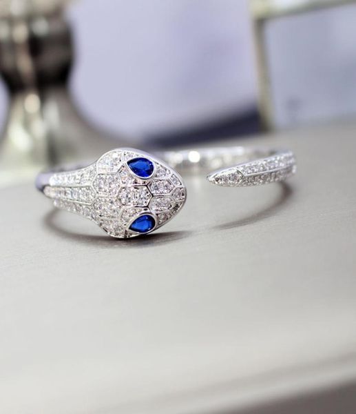 Nouveau designer de haute qualité pierre de zircon pavé yeux bleus bracelet manchette animal bracelet 18 carats plaqué or blanc bijoux PUNK pour femmes 8481580
