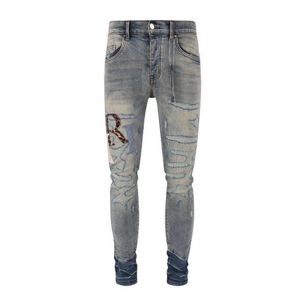 Nuevos pantalones vaqueros de diseñador Marca de moda High Street Letras andrajosas parcheadas con agujeros bordados Vaqueros azules lavados elásticos y ajustados para hombres